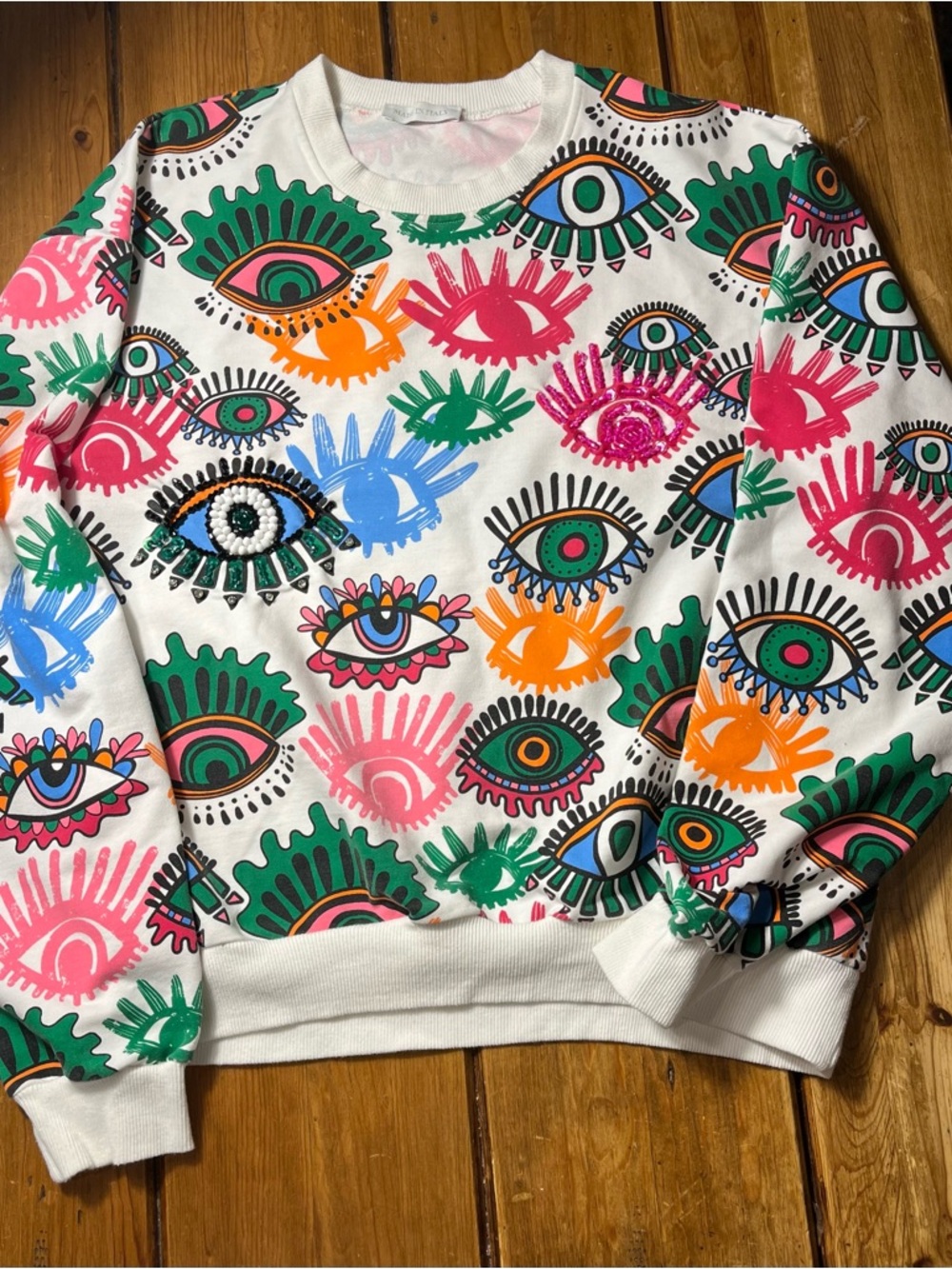 White Eye Print Graphic Sweatshirt with beading in Multicolor